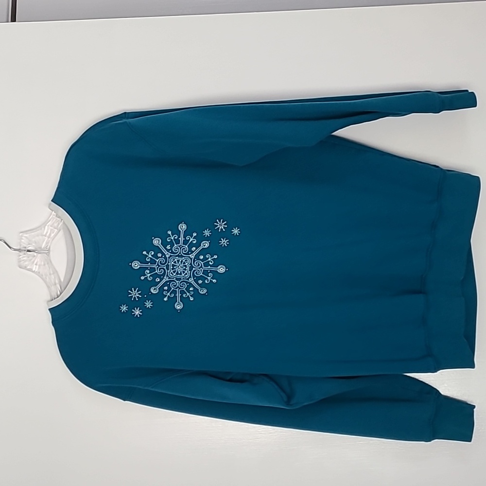 Women's M&C Sportswear sweatshirt.  Teal with silver design.  Size small.